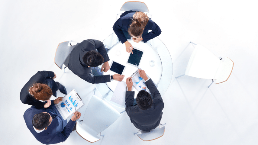 Profit Improvement Coach - business owners Profit Improvement Coach - business owners - image shows business meeting seen from above